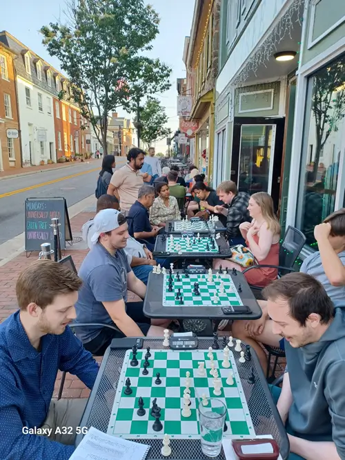 Playing Chess Outdoors - Green Tree Tavern Restaurant on Monday Night
